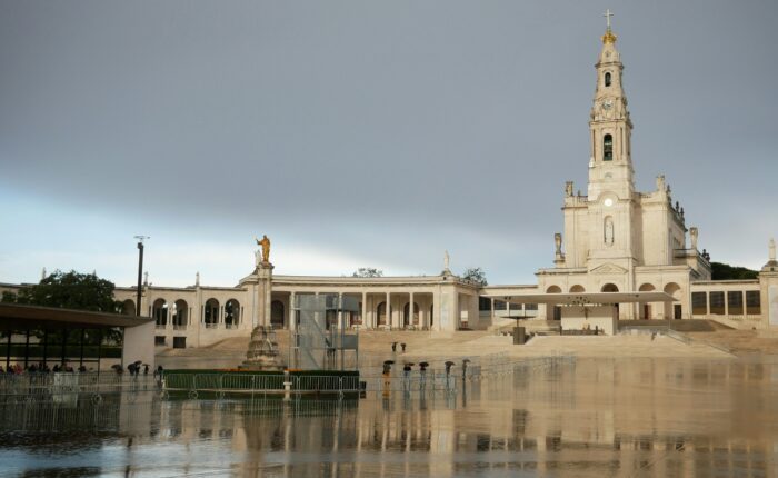 Panoramic view of the Shrine of Our Lady of Fatima in Portugal, featuring the Basilica and open-air prayer area, captured during a private guided tour with Premiere Tours.