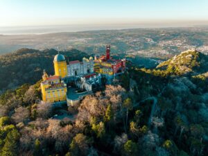 <img src="pena_palace_exterior.jpg" alt="Vibrant exterior of Pena Palace, Sintra, Portugal">